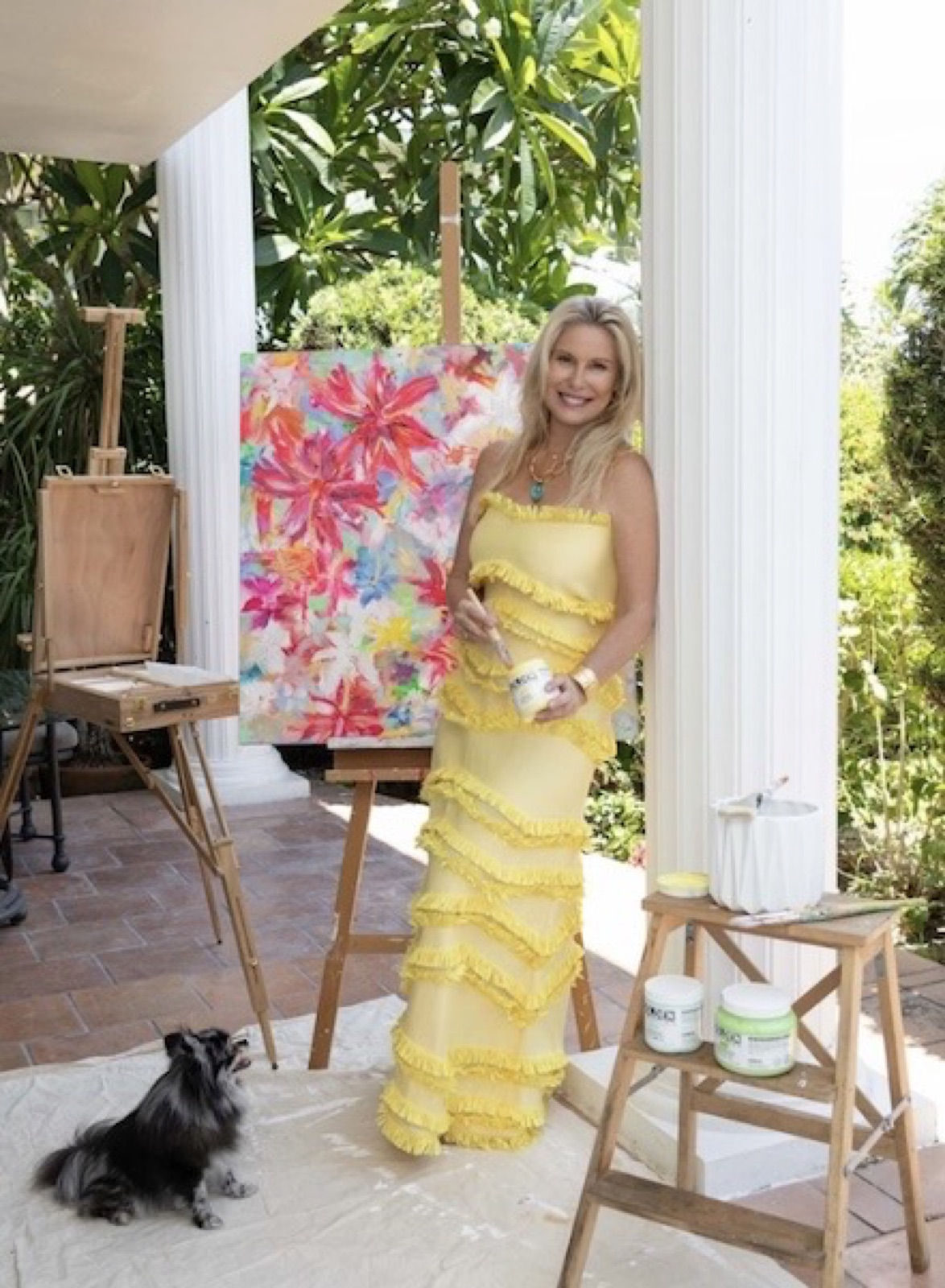 Carol Calicchio painting at her easel