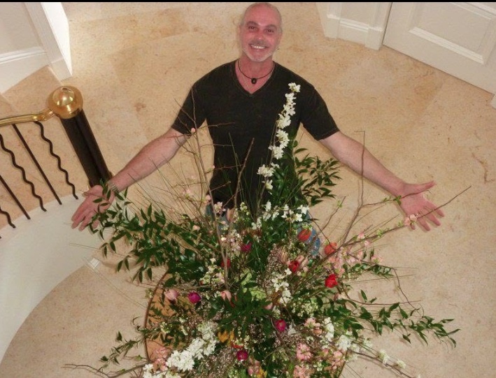 Joseph Roehm of From Roehm With Love with one of his floral arrangements